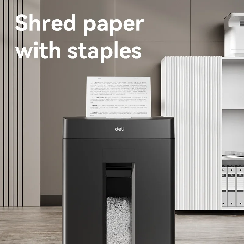 Malaysia office staff shredding confidential documents using Deli ET022