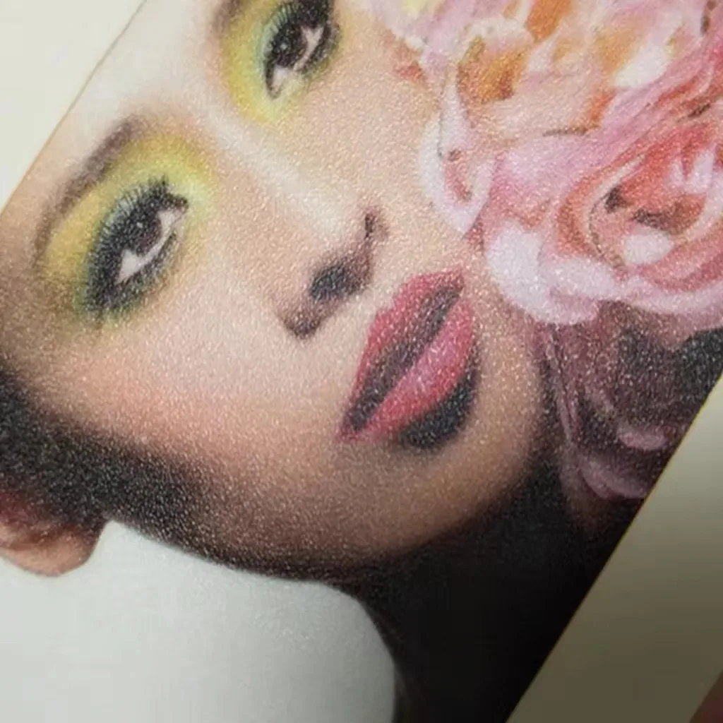 Gold sand laminate film roll with close-up texture detail